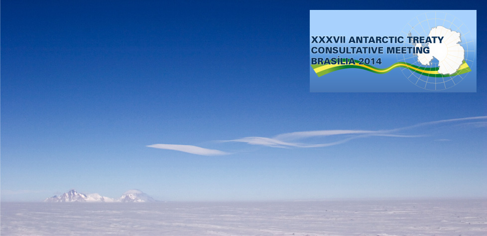 A vast, snowy Antarctic landscape under a clear blue sky with distant mountains; an overlayed graphic in the top right reads XXXVII Antarctic Treaty Consultative Meeting Brasília-2014 with an image of Antarctica and a nod to Antarctic Logistics and Expeditions.
