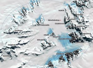 Satellite map of a snowy mountainous region, showing labeled peaks, valleys, and camps such as Union Glacier Camp, Elephant Head Valley, Mount Rossman, and Mount Capley. Blue glacier areas and rugged terrain are visible.