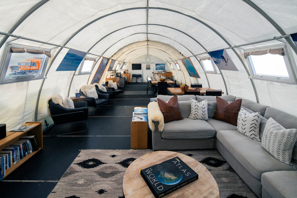 Interior of dining tent and lounge area at Three Glaciers Retreat.