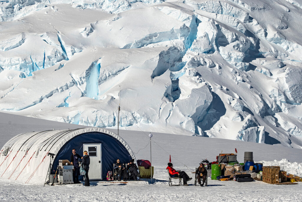 Relaxing outside dining tent, Day visit to base camp, ALE / Ken Borek Twin Otter flight Union Glacier to Vinson base camp,