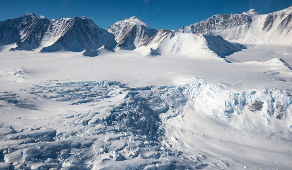 Mts Tyree, Epperley, Shinn and Vinson (right) aerial view, after take-off, Vinson base camp, Branscombe Glacier, Ellsworth Mountains.,